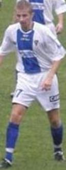 Tomasz �wi�der