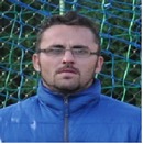 Adam Podbio�