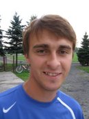 TOMASZ PIENI��EK